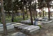 سنگ قبر قرآن‌خوان چینی!