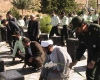 غبار روبی گلزار شهدای تویسرکان توسط سبزپوشان نیروی انتظامی
